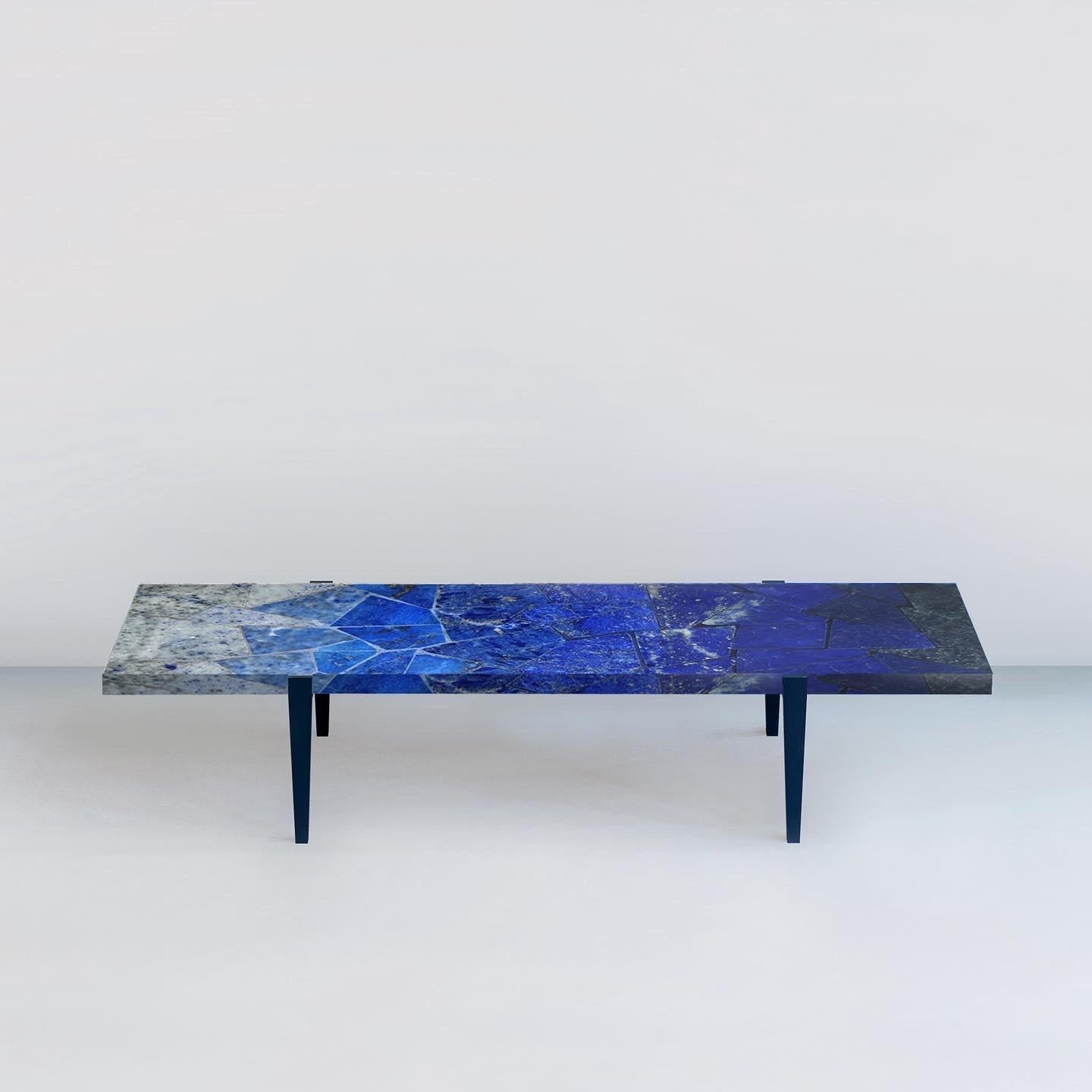 Topaa'nga I table by Studio Lel
Dimensions: W 183 x D 61 x H 35.5 cm
Materials: Lapis Lazuli, Granite, Metal

These are handmade from semiprecious stone and marble in a small artisanal workshop. Please note that variations and slight