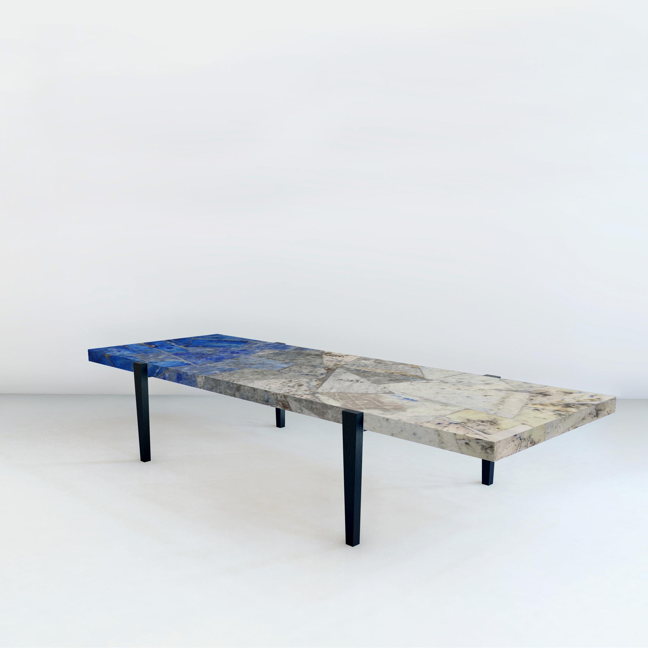 Topaa'nga II table by Studio Lel
Dimensions: W 183 x D 61 x H 35.5 cm
Materials: Lapis Lazuli, Granite, Metal

These are handmade from semiprecious stone and marble in a small artisanal workshop. Please note that variations and slight