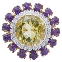 Ring aus 14 Karat Roségold mit Topas, Amethysten, Diamanten