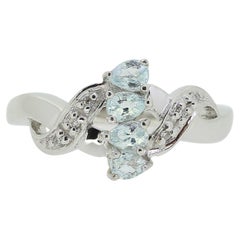 Topaz and Diamond Twist Ring