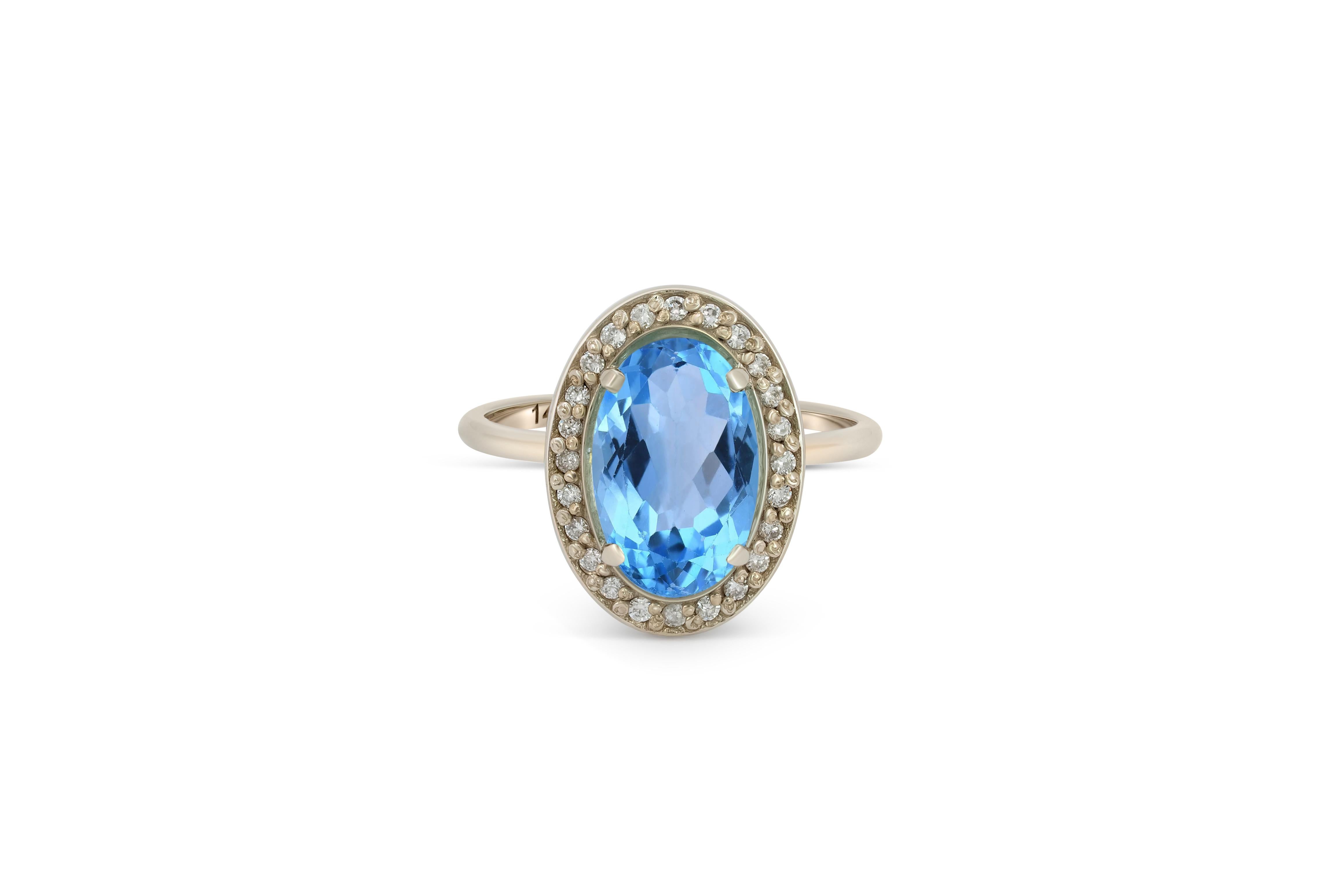 Modern Topaz and diamonds 14k gold ring.  For Sale