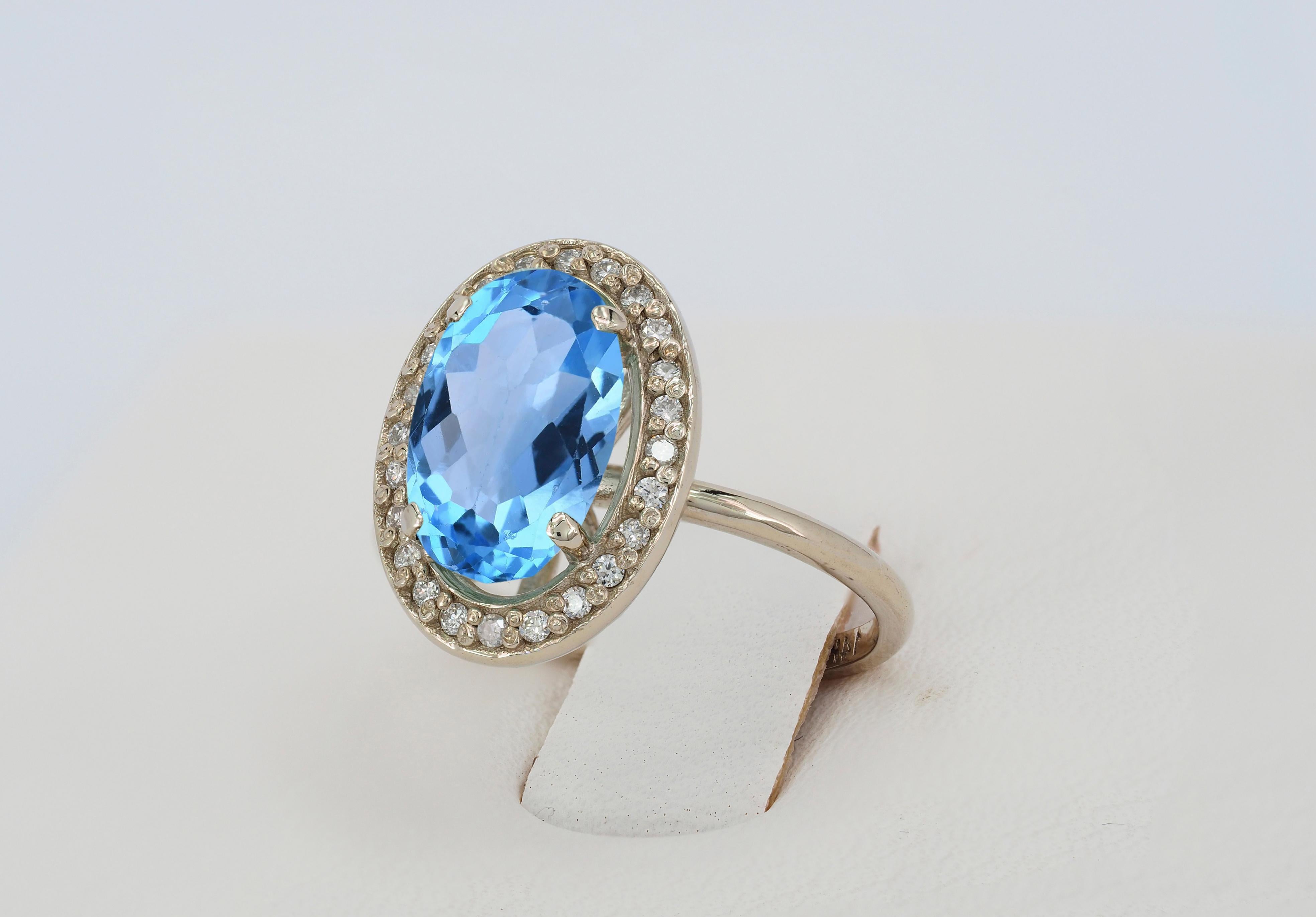 For Sale:  Topaz and diamonds 14k gold ring. 7