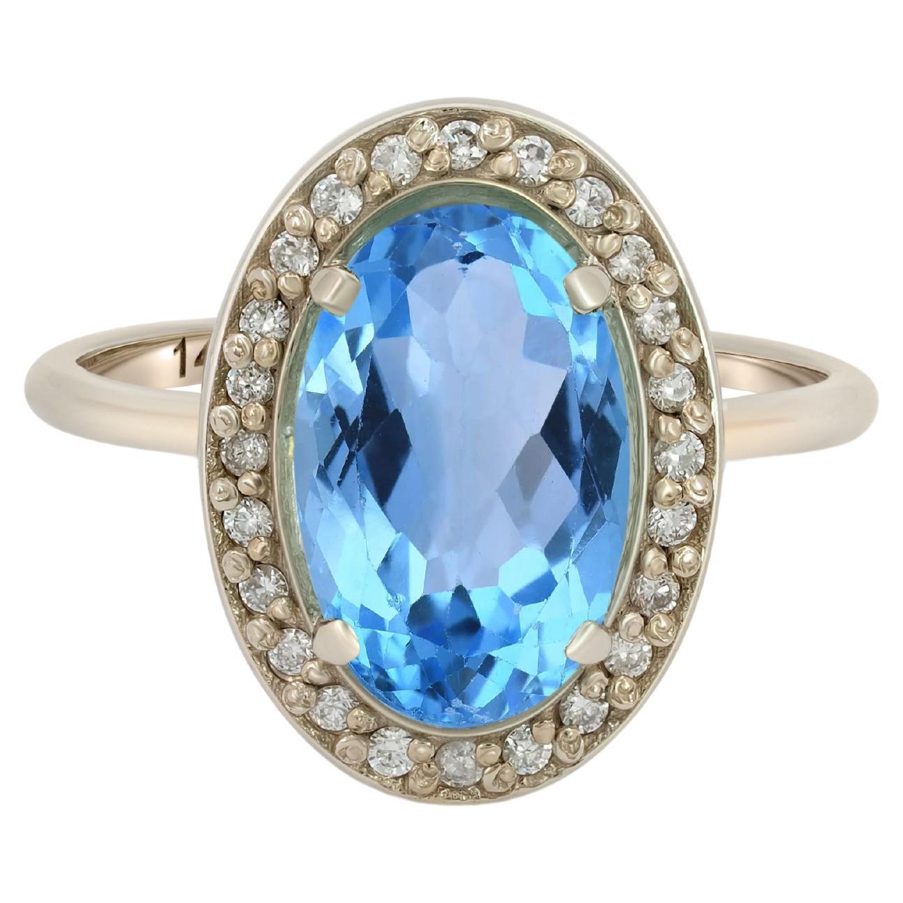 For Sale:  Topaz and diamonds 14k gold ring.