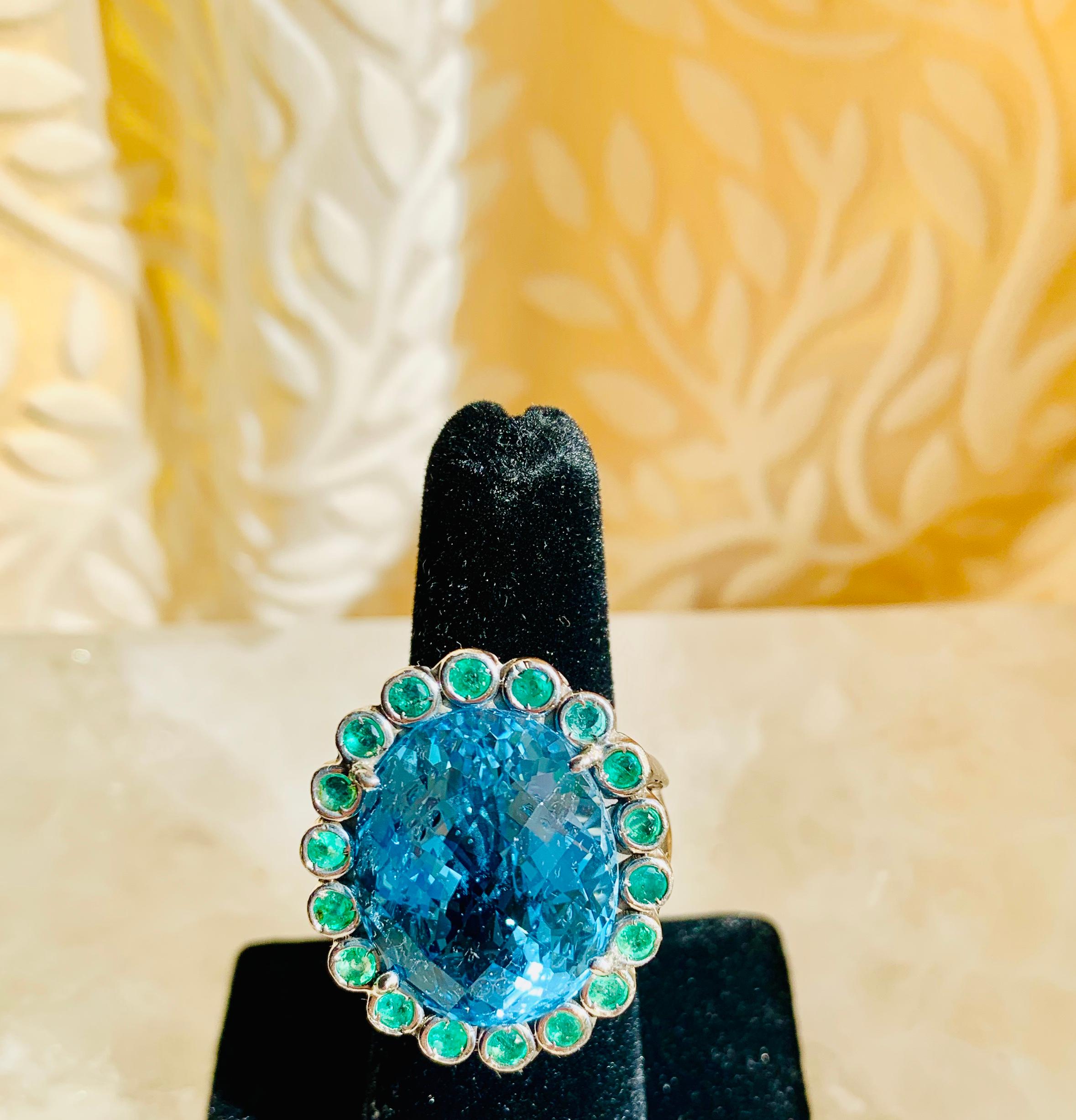 Cushion Cut 33.50 Carats Blue Topaz and Emerald Cocktail Ring For Sale