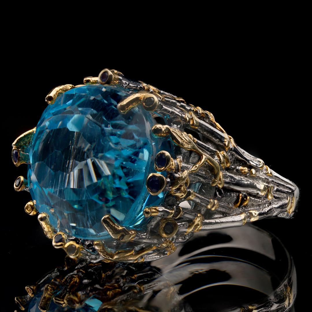 Oval Cut Topaz and Sapphire Ring For Sale
