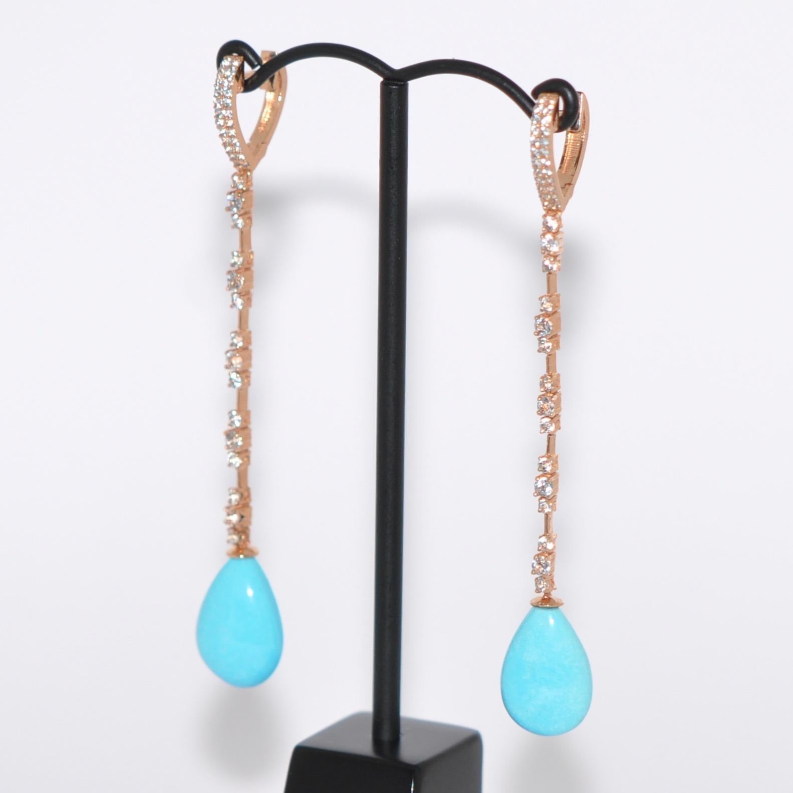 Discover this Topaz and Turquoise on Yellow Gold 18 Karat Chandelier Earrings.
Topaze
Turquoise
Yellow Gold 18K