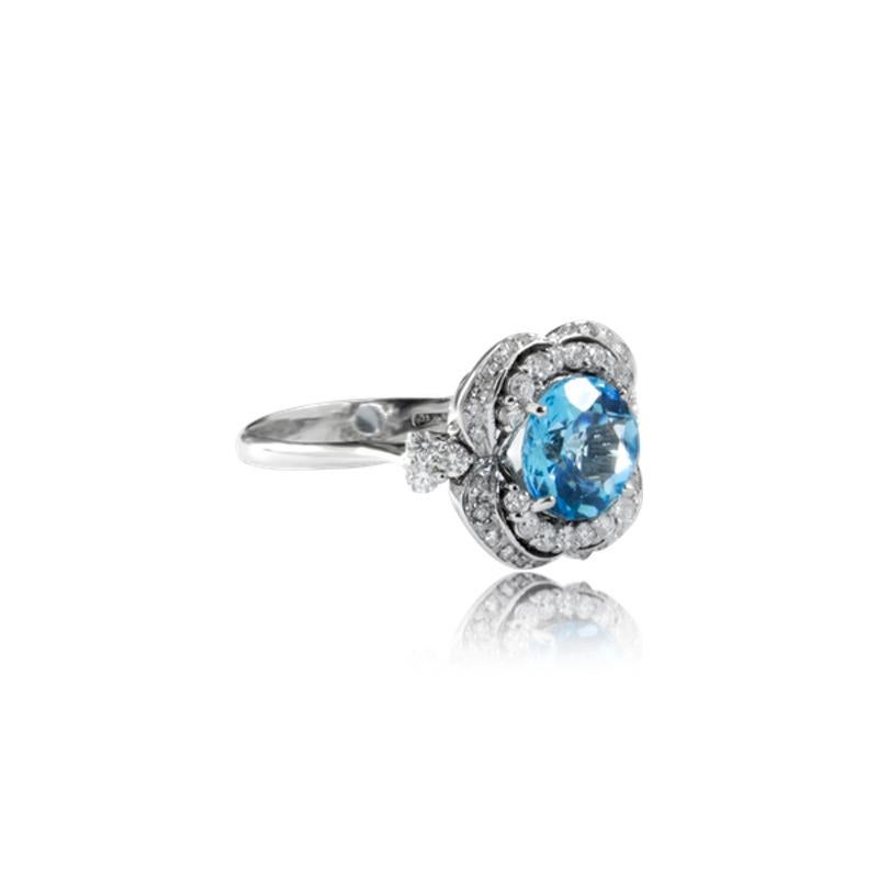 - Handmade in our 150 year old workshop South of Rome, Italy
- Set in 18k White Gold
- 2,20ct Handcut Topaz
- 0,34ct White VVS- F Diamonds
- US Size 8 but can be re-sized

Handcrafted in our 150 year old workshop this ring is a true work of art. Our