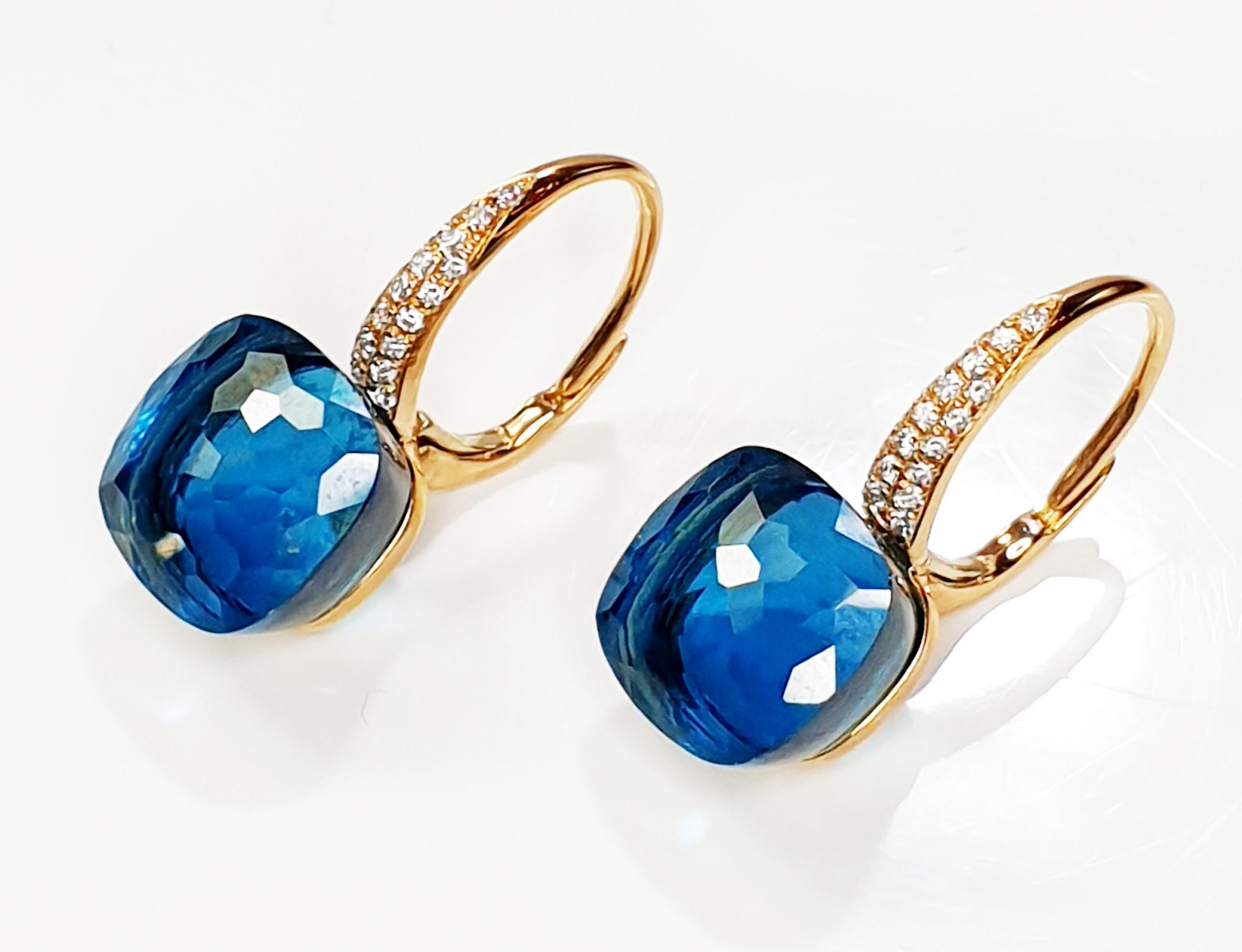TopazBlue Londra  Orecchini pendenti in oro rosa 18 carati sfaccettati con pavé di diamanti
 La coppia di orecchini pesa in totale 2,5 grammi e misura 22 mm o 0,75 pollici.
I topazi sono di 4,00ct ciascuno e il pavé di 40 diamanti è di