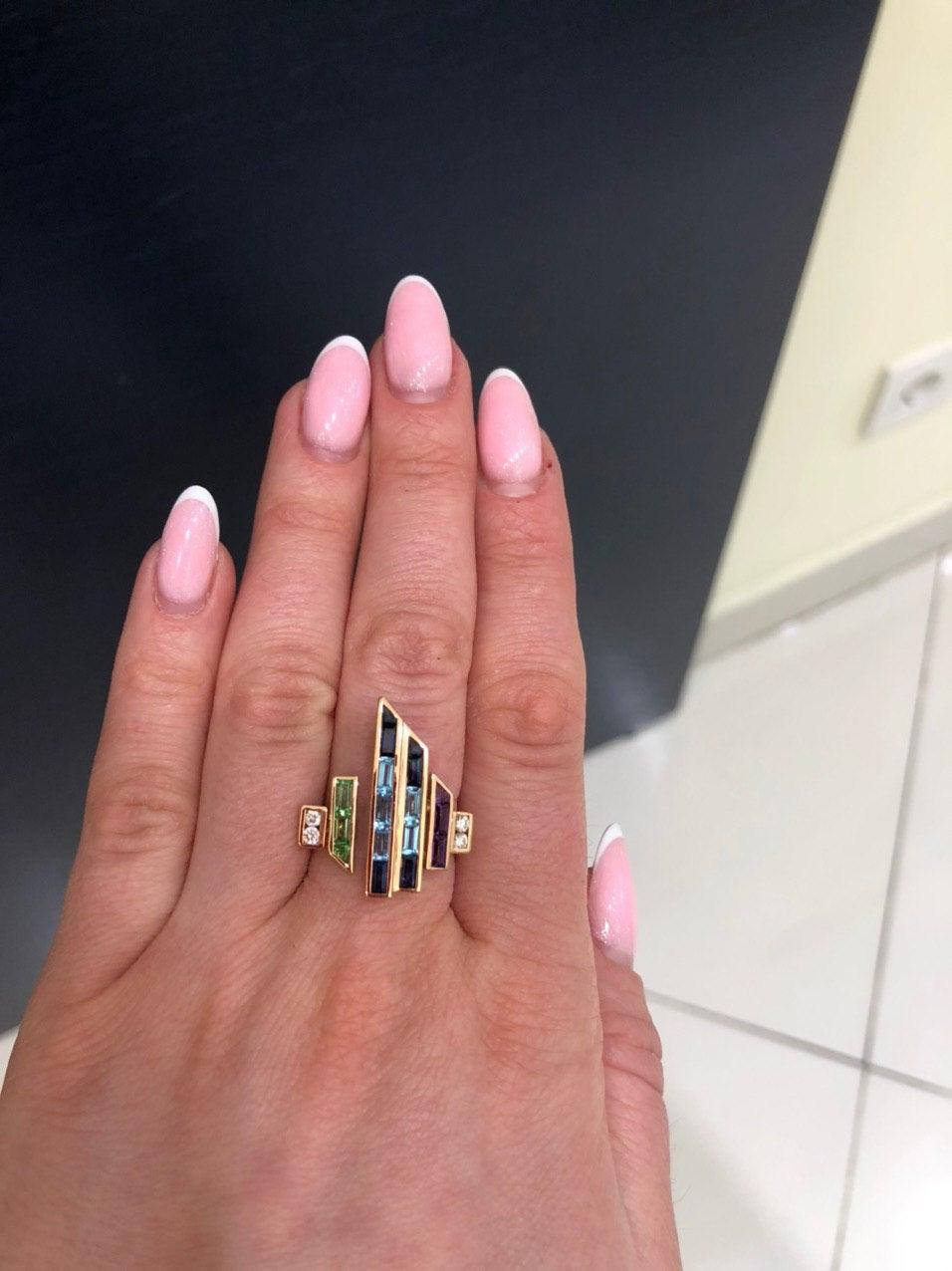 En vente :  Bague en or jaune avec topaze, saphir bleu, améthyste et diamant 4