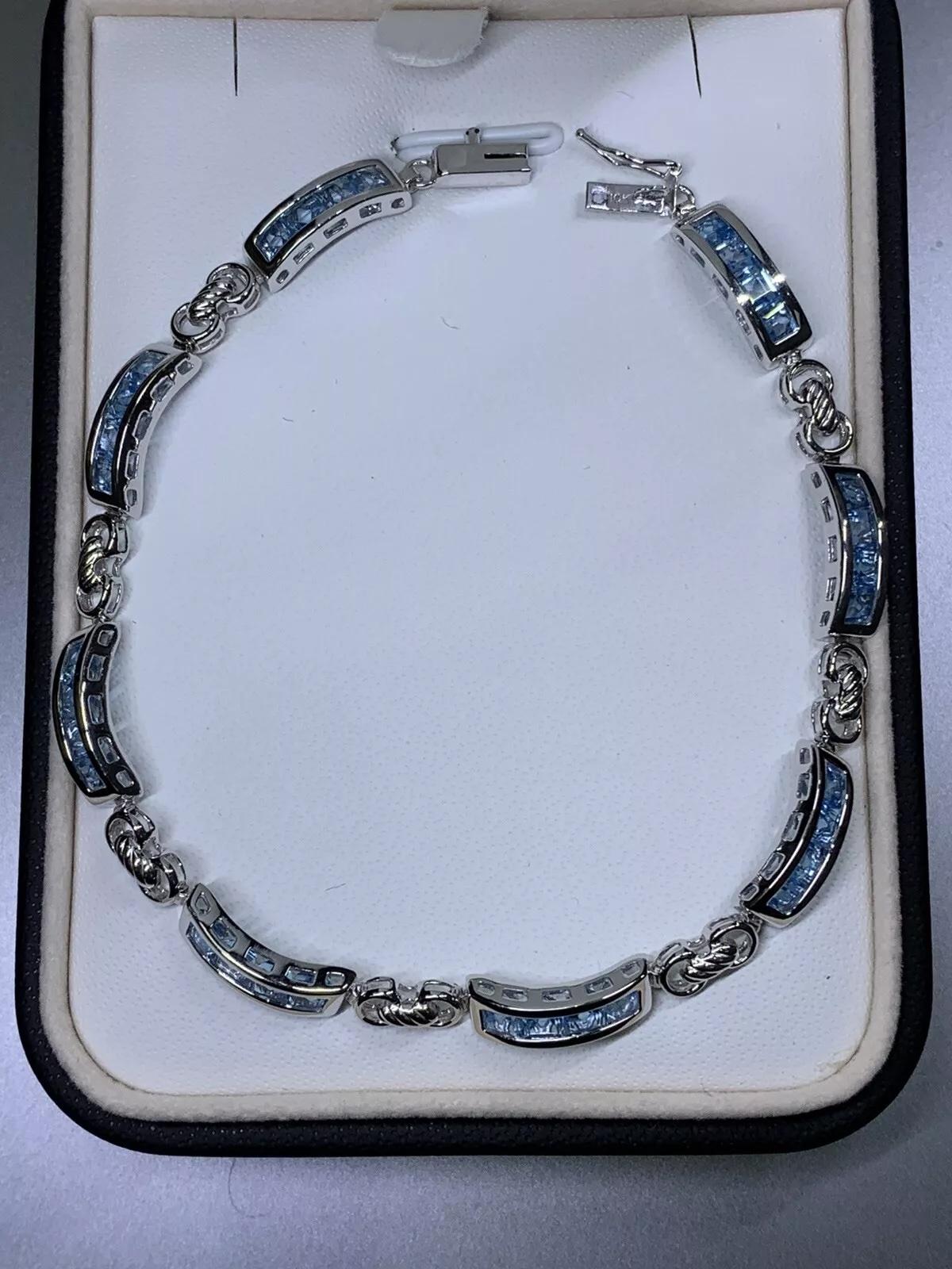 Pulsera de tenis azul topacio en oro blanco de 10 quilates. en venta 1