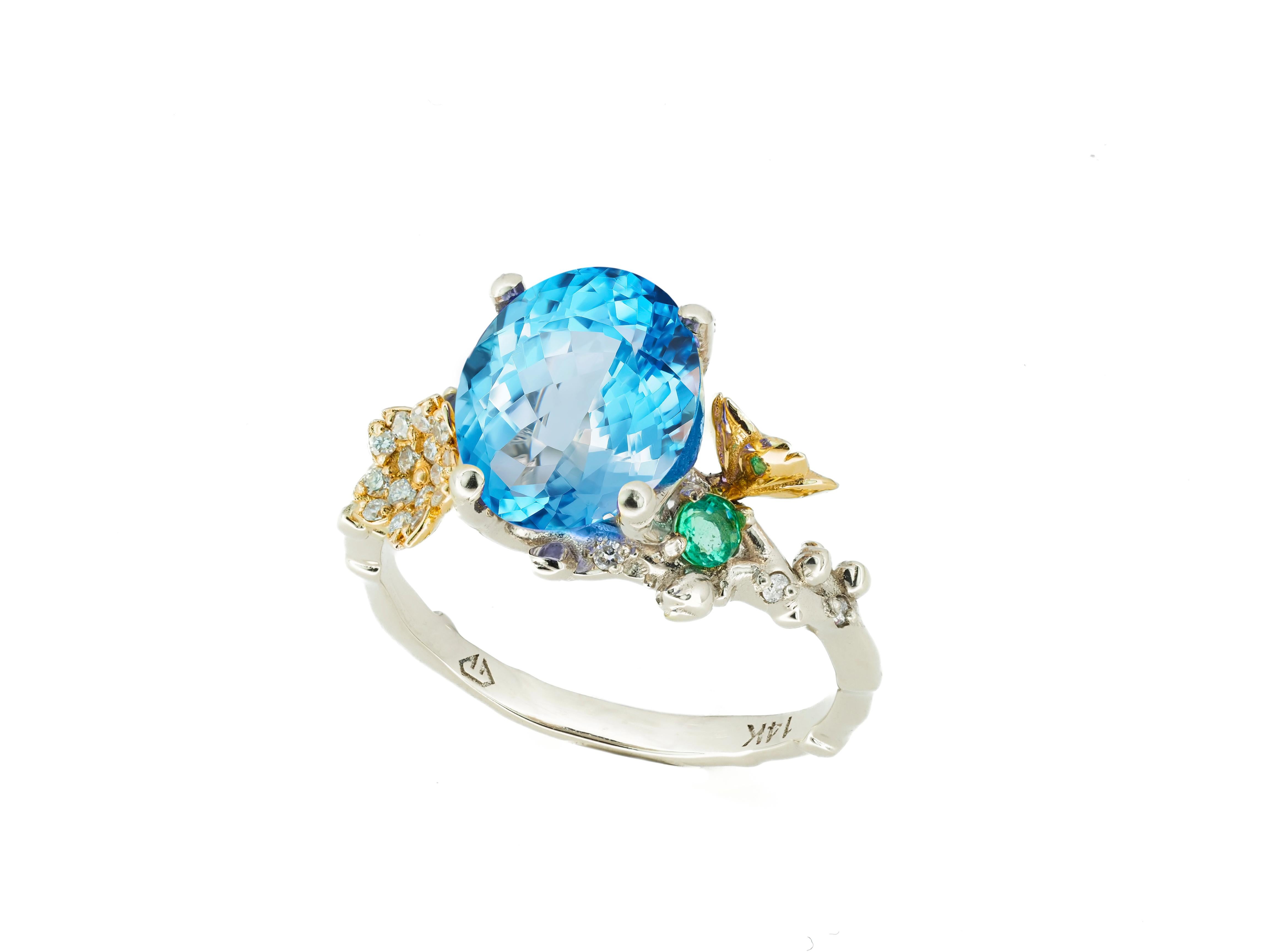 Topaz cocktail ring. 
Sky blue Topaz 14k gold ring. Topaz statement gold ring. Oval Topaz ring. Topaz and diamonds ring. Flower gold ring.

Metal: 14k gold : yellow and white.
Weight: 3.85 gr depends from size.

Central stone natural Topaz
Weight:
