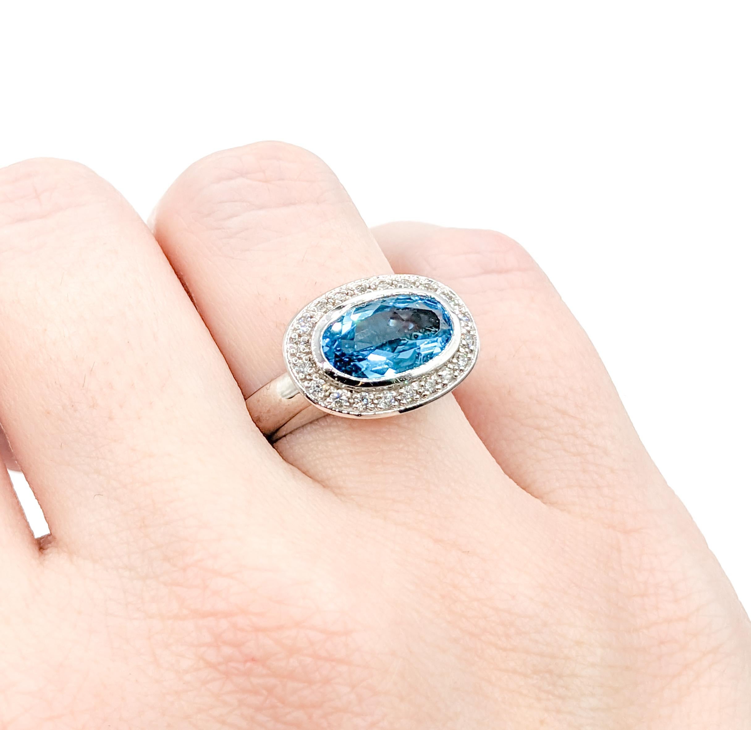 Oval Cut Topaz & Diamond Halo Ring in White Gold For Sale
