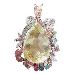 Colgante de topacio, esmeraldas, rubíes, zafiros, diamantes, oro rosa y plata.