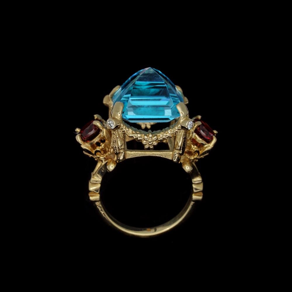 9 Karat Yellow Gold Ring with Blue Topaz, Garnets and Diamonds For Sale 2