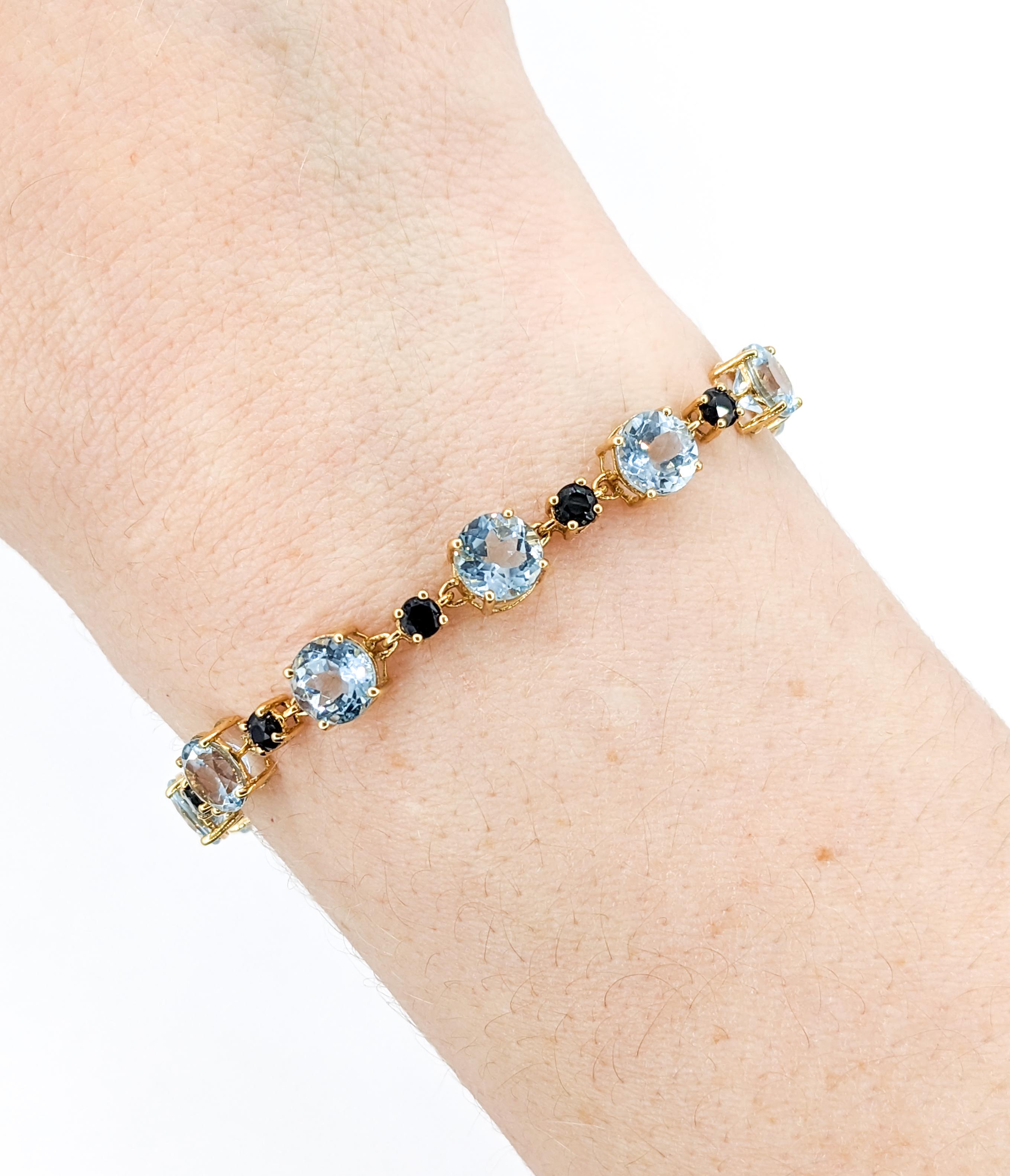 Topaz & Midnight Sapphire Gemstone bracelet Yellow Gold 

Introducing this stunning Bracelet, beautifully crafted in 18k yellow gold. It features an exquisite Topaz & Sapphire gemstone, known for its brilliant clarity and captivating white sparkle.