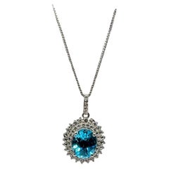 Topaz Necklace in Sterling Silver - 10x8mm Blue Topaz, 0.40ctw White Topaz, 18"