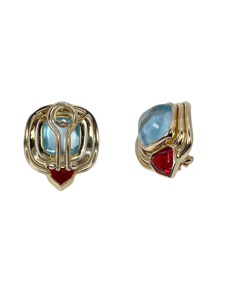 Topaz & Opal earrings 18KT yellow gold Vintage clip on omega earrings In Excellent Condition For Sale In Jupiter, FL
