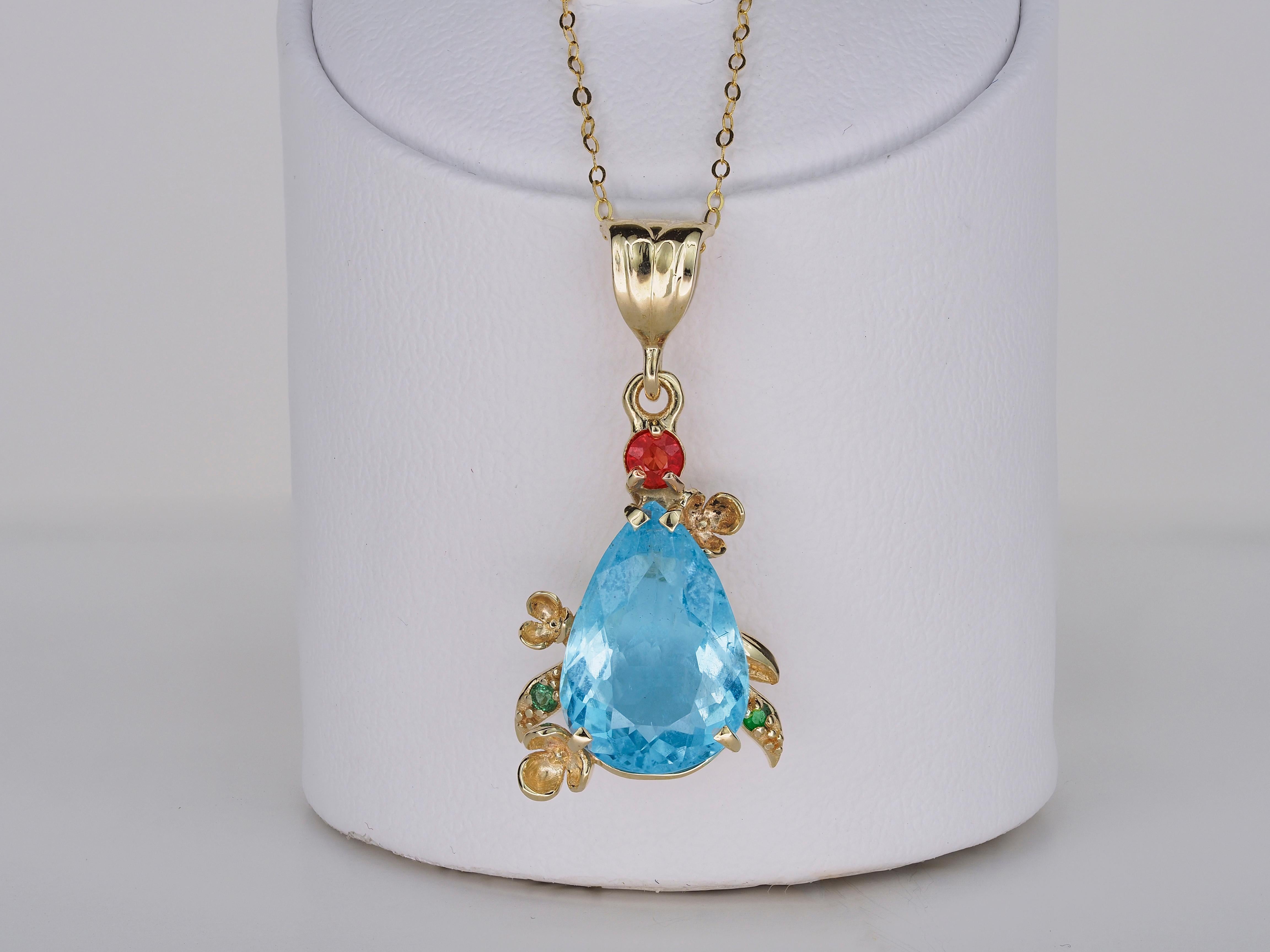 Pear topaz pendant in 14 karat gold.  Flower design pendant with natural topaz. Novemvber birthstone topaz pendant.

14 karat gold
Weight: 2.75 g.
Pendant size: 30x14.5 mm 

Set with topaz, color - sky blue
pear cut, aprox 5 ct 
Clarity: