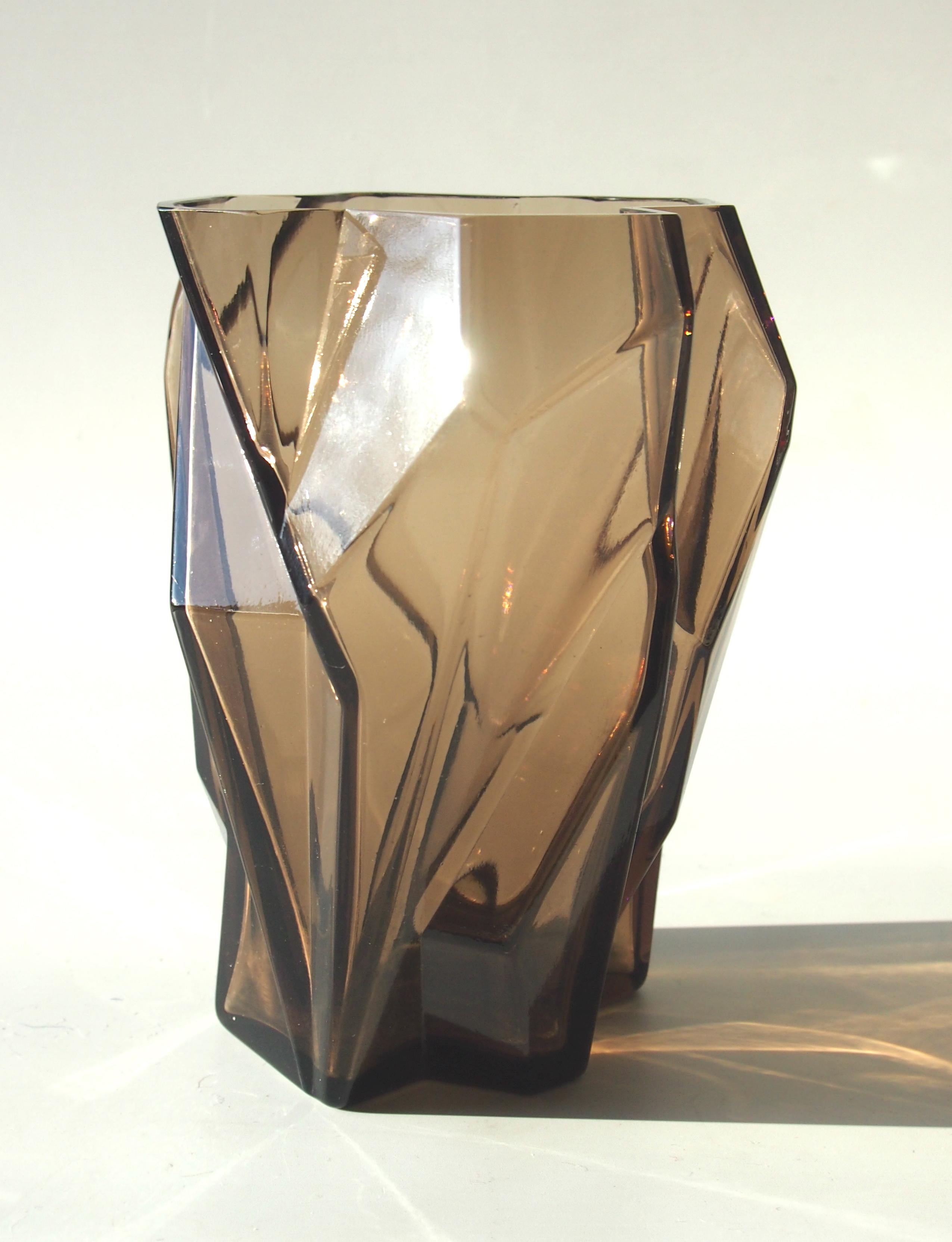 One of the most iconic pieces of glass there is. A topaz Ruba Rombic vase by Phoenix Consolidated Glass designed by Reubin Hailey and produced only between 1927 and 1933. The topaz colour gives it a interesting mix of brown and purple highlights.