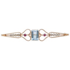 Topaz, Rubies, Diamonds, 14 Karat Rose Gold Brooch.