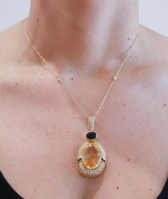 Topaz, Sapphires, Diamonds, 18 Karat Yellow Gold Pendant Necklace.