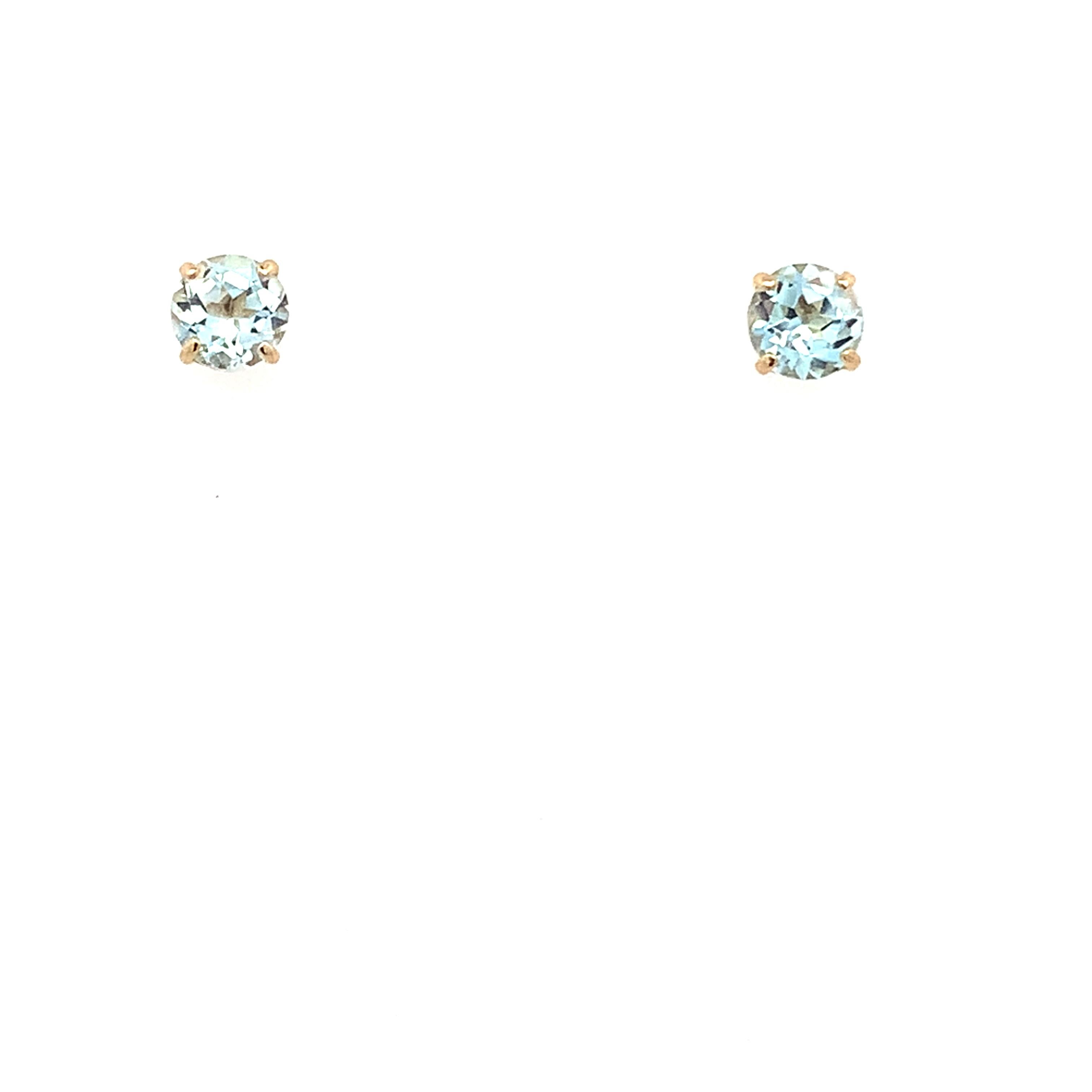 Topaz solitaire stud earrings yellow gold