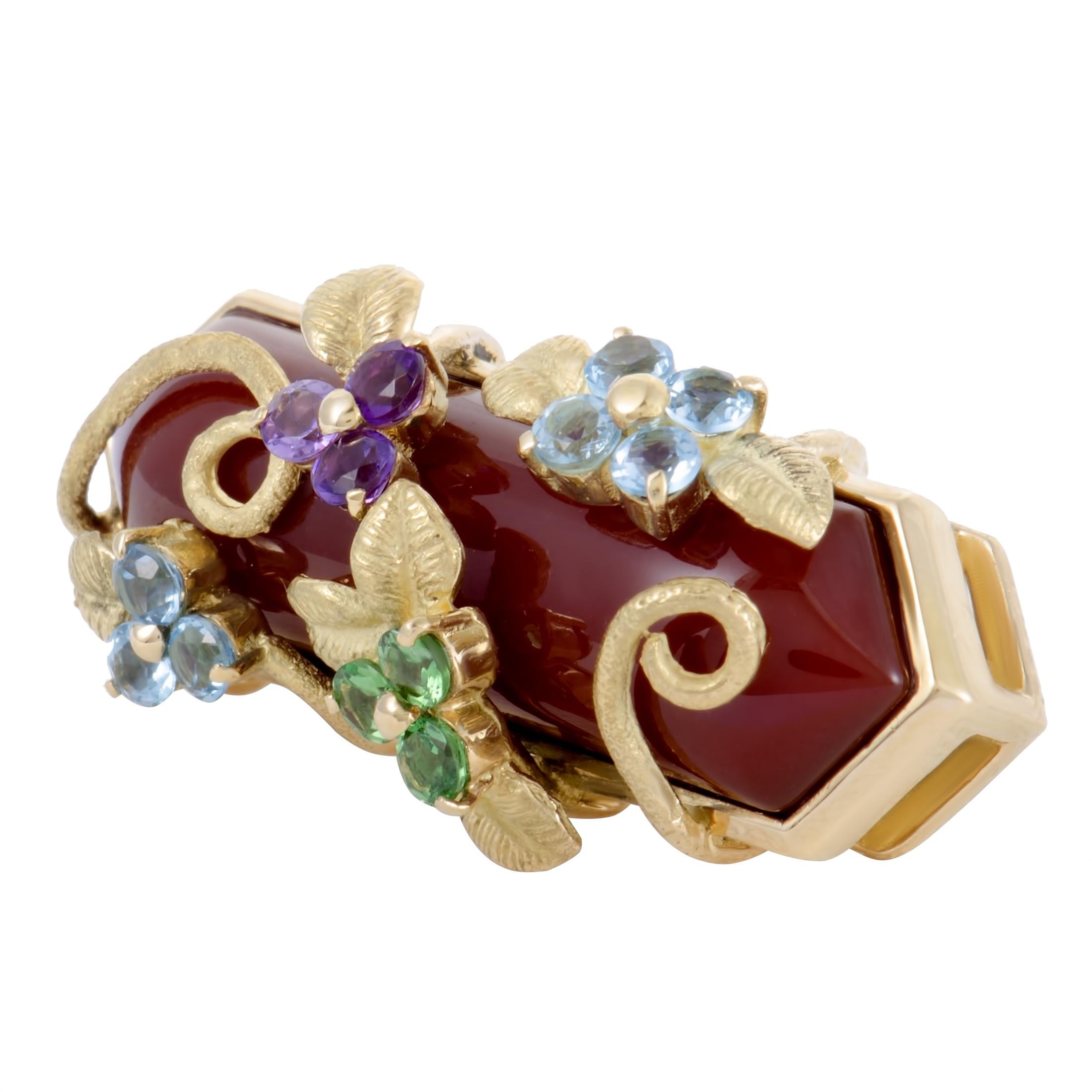 Alluringly graceful design is marvelously presented in enchanting 18K yellow gold in this sublime brooch that boasts vibrant décor, comprised of jasper, topaz, tsavorite and amethyst stones.
