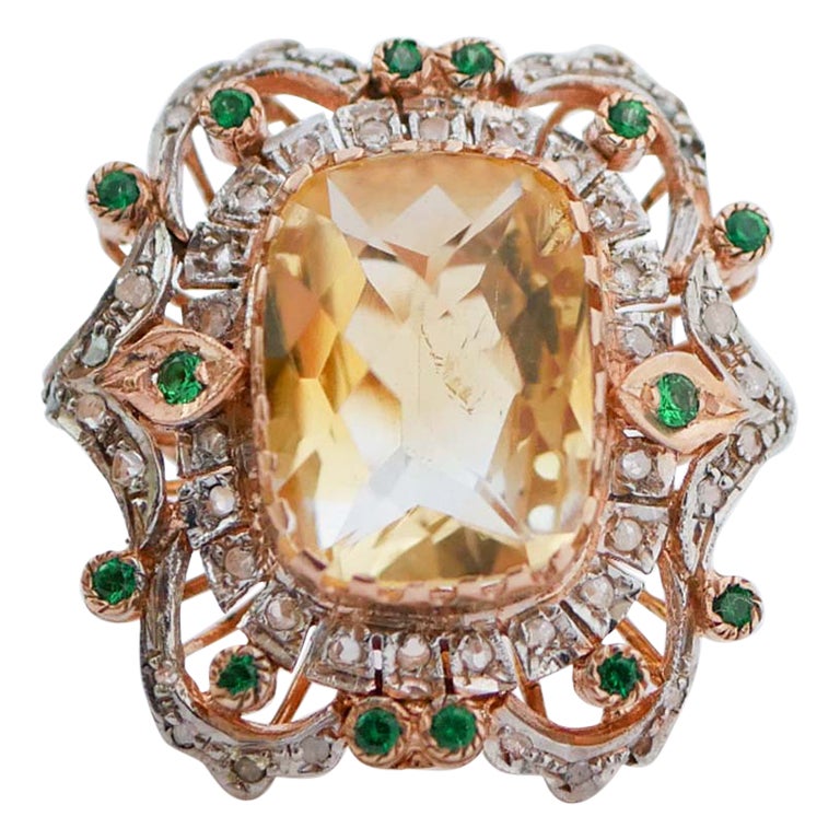 Anello con topazio, tsavorite, diamanti, oro rosa e argento.