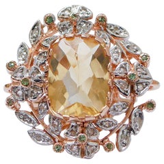 Anello con topazio, tsavorite, diamanti, oro rosa e argento.