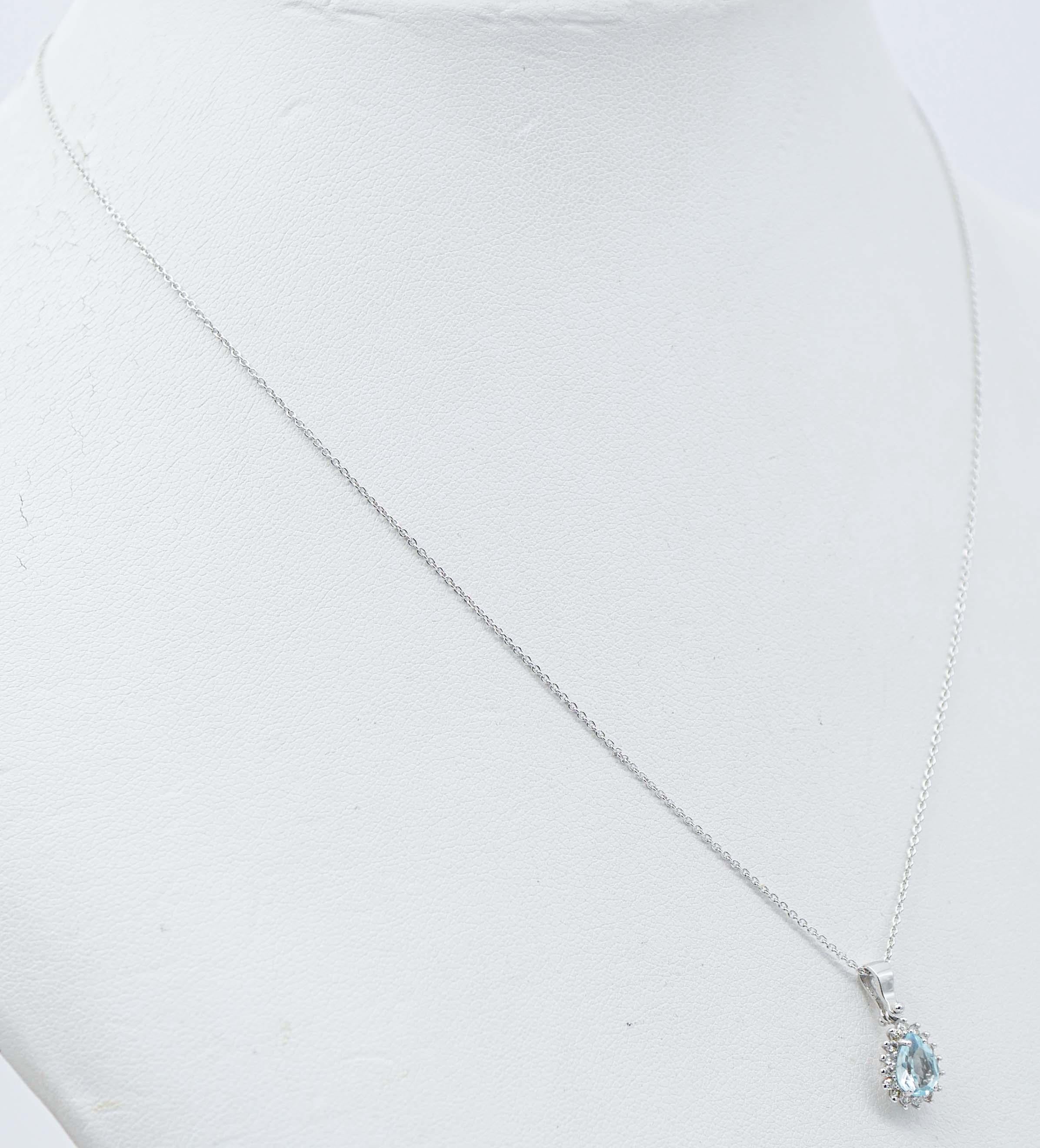 Modern Aquamarine Colour Topaz, Diamonds, 18 Karat White Gold Pendant Necklace For Sale