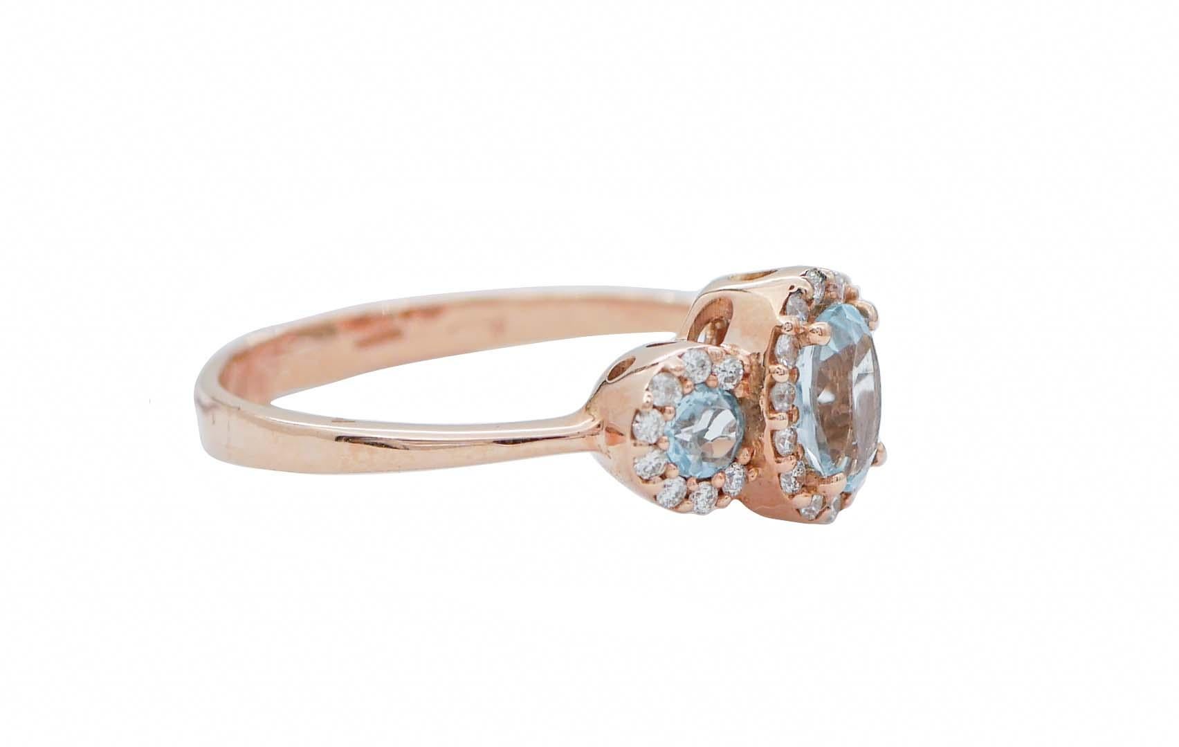 Amazing ring in 18 kt rose gold structure mounted with an oval topaz in the centrer part surrounded by diamonds between two round topazs and diamonds.
Diamonds 0.27 ct
Topazs 1.12 ct
Total Weigth 3.00 gr
RF  G    GFHE
RK.AUGH
Italian Size 16.5
Usa