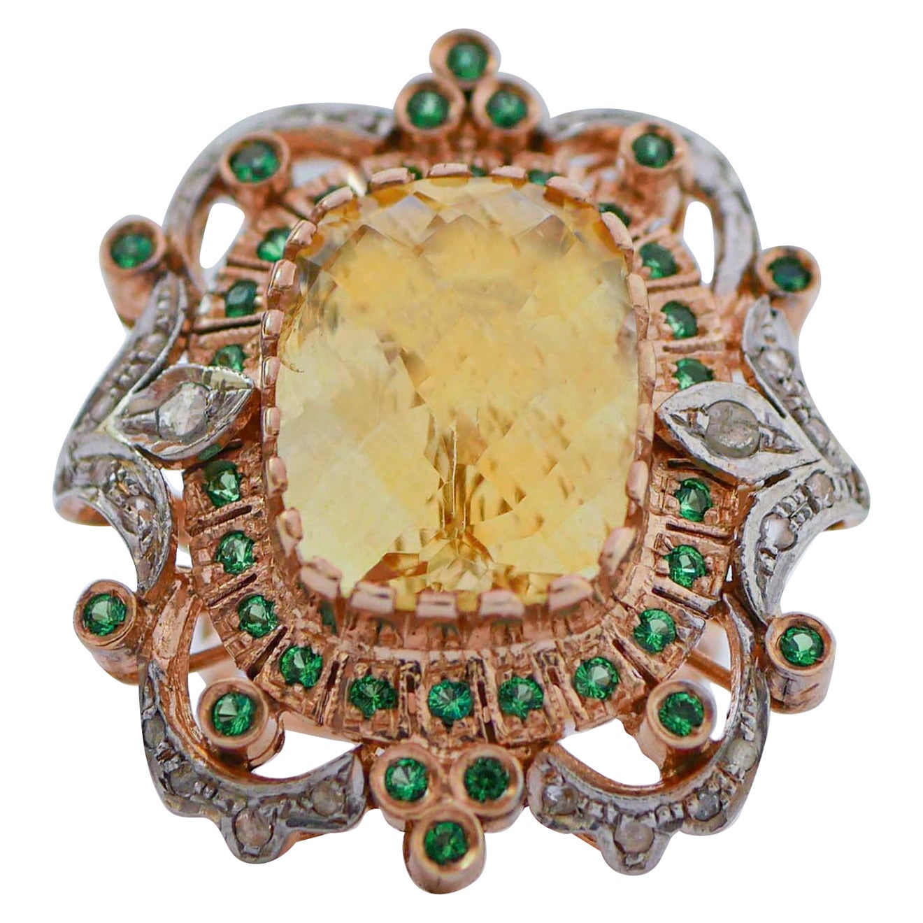 Topazi, diamanti, spinello idrotermale, anello in oro rosa e argento.