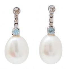 Topazs, Diamonds, Pearls, 14 Karat White Gold Tennis Earrings.