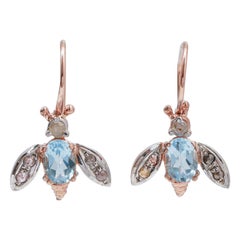 Topazs, Diamonds, Rose Gold and Silver Fly Shape Earrings.