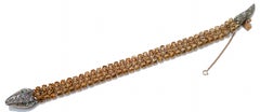 Topazs, Emeralds, Diamonds, Rose Gold and Silver Snake Bracelet.