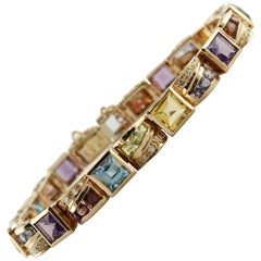 Topazi, peridoti, granati, iolite, ametiste, diamanti, bracciale in oro rosa 14Kt