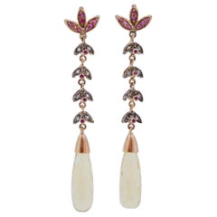 Boucles d'oreilles en or rose, topaze, rubis et diamants.