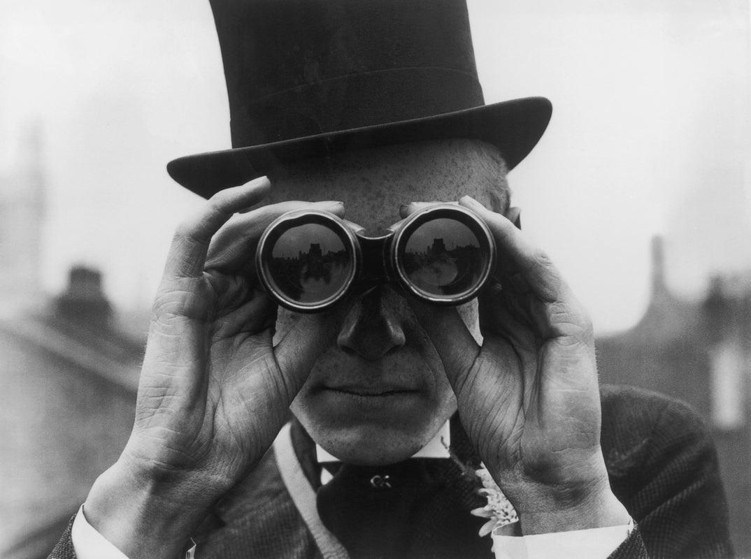 "Derby Spectator" by Topical Press Agency

A spectator looking through binoculars at the Derby horse races, Epsom, Surrey, June 1923.

Unframed
Paper Size: 20" x 24'' (inches)
Printed 2022 
Silver Gelatin Fibre Print