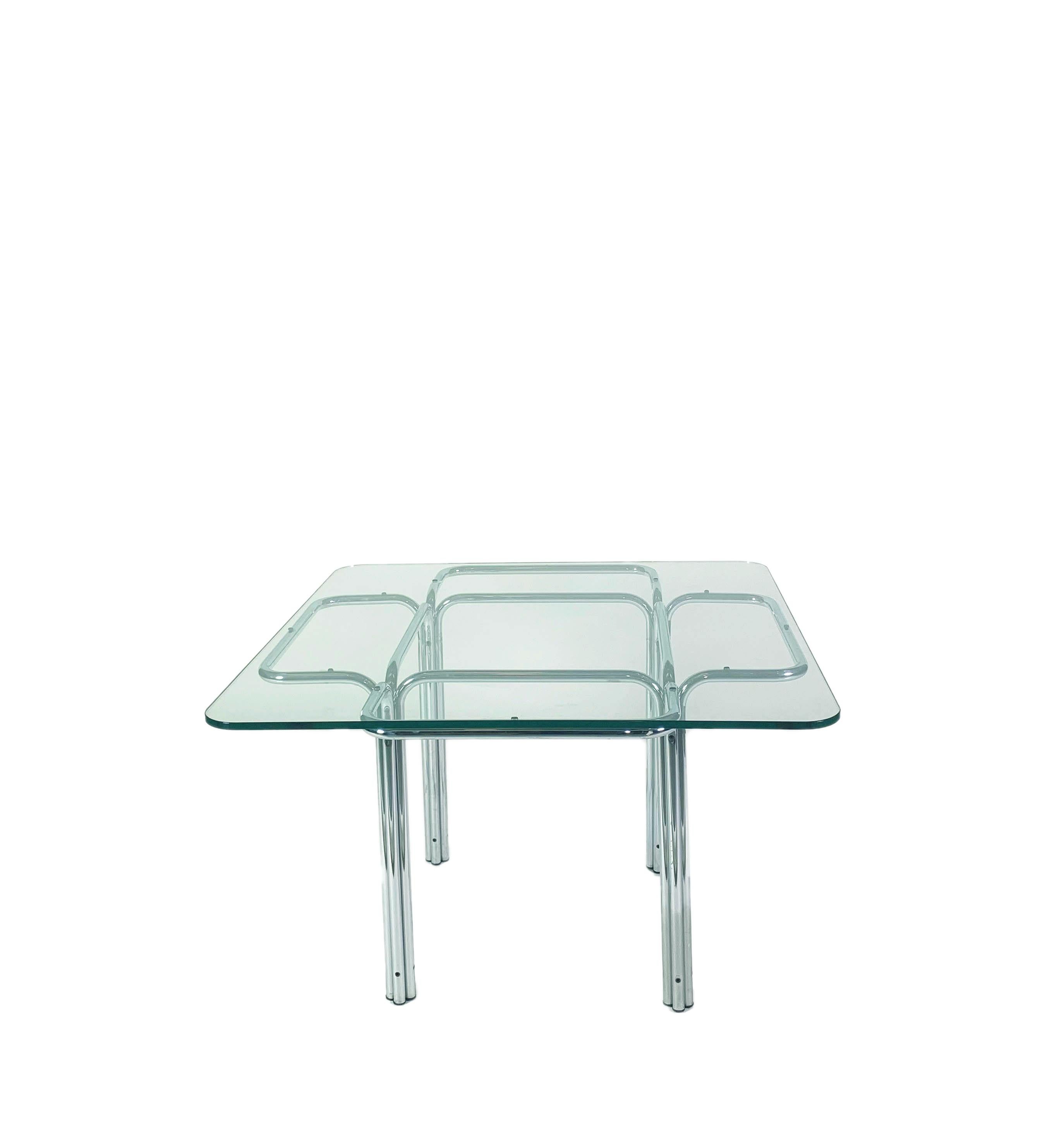 Powerfully expressive, Topos table draws inspiration from the fluid, organic shape of flower, true sculpture produced by nature. The structure has a metal tubing with polished chrome finish rises from the ground and opens like a flower to form a