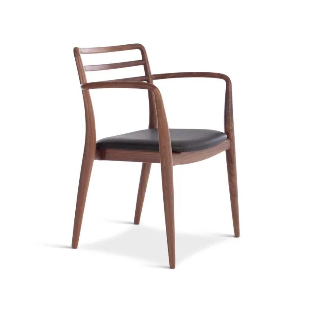 Tor arm chair by Dare Studio, 2015
Dimensions: H 78.5 x D 51.5 x W 57.5 cm
Materials: American black walnut, black leather

Also available in ash - stained canaletta, oak - natural, ash - natural, ash - stained black, wax oiled finish.
All