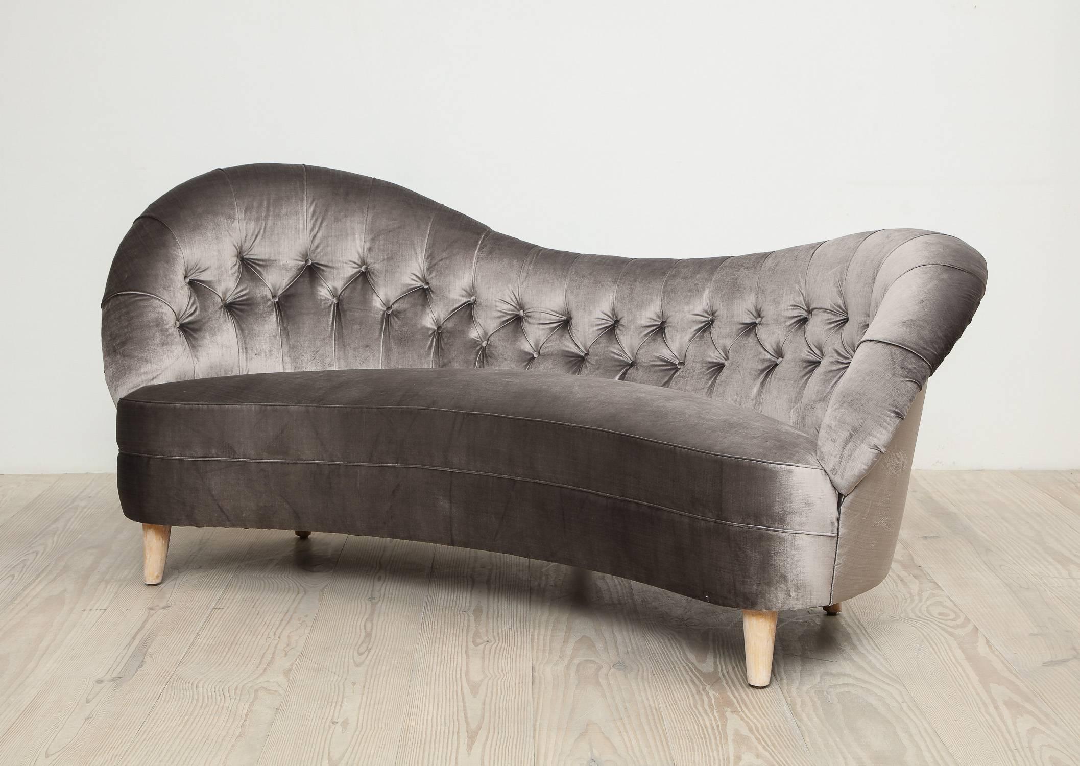 Tor Wolfenstein (Swedish) organic shaped sofa with birch feet, manufactured for Ditzingers Workshop, origin: Stockholm, Sweden, circa 1940

Reupholstered in a beautiful grey velvet fabric Lizzo by Kravet.
 