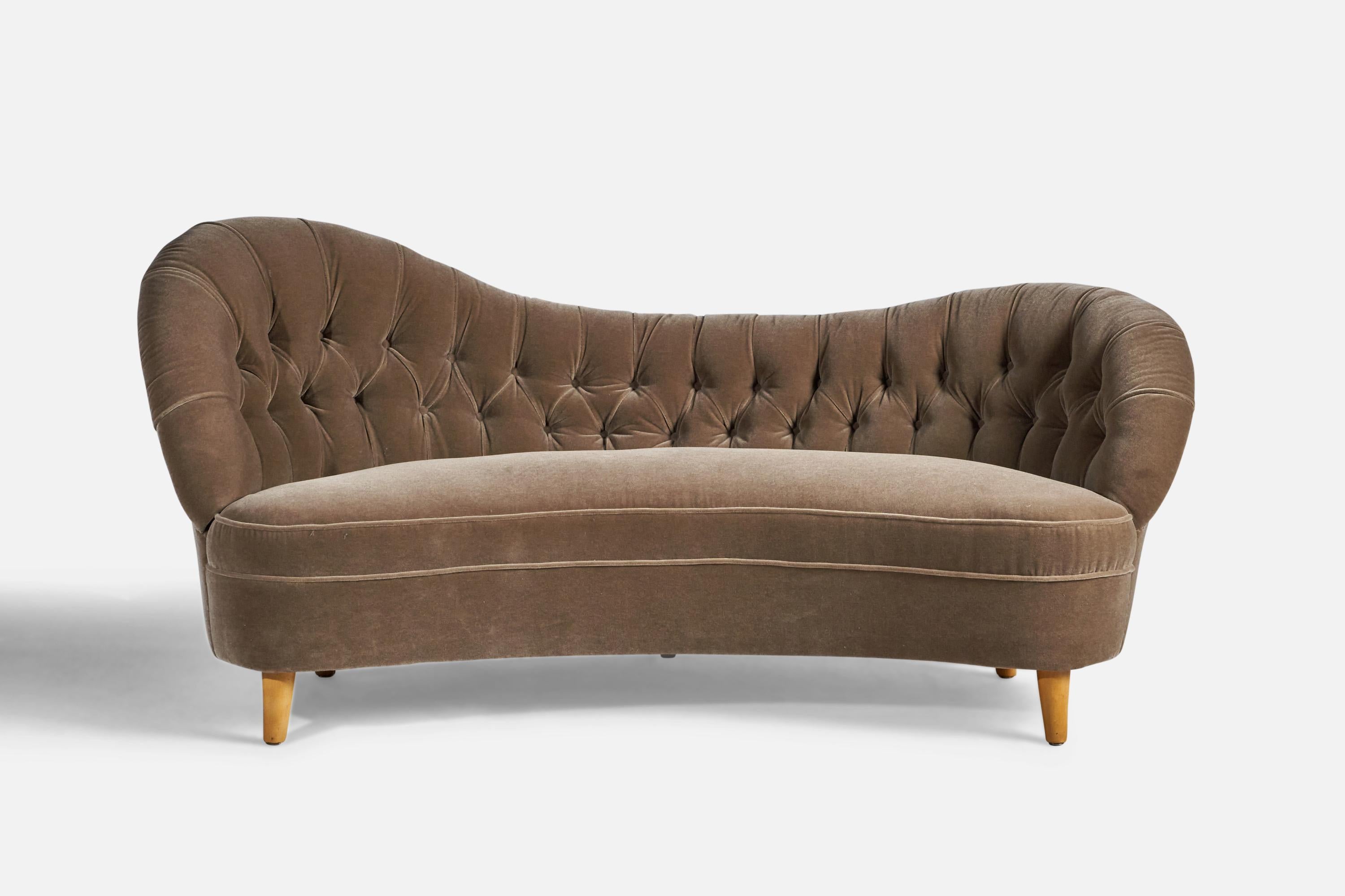 An organic wood and grey mohair sofa, designed by Tor Wolfenstein and produced by Ditzingers, Sweden, c. 1940s.

18