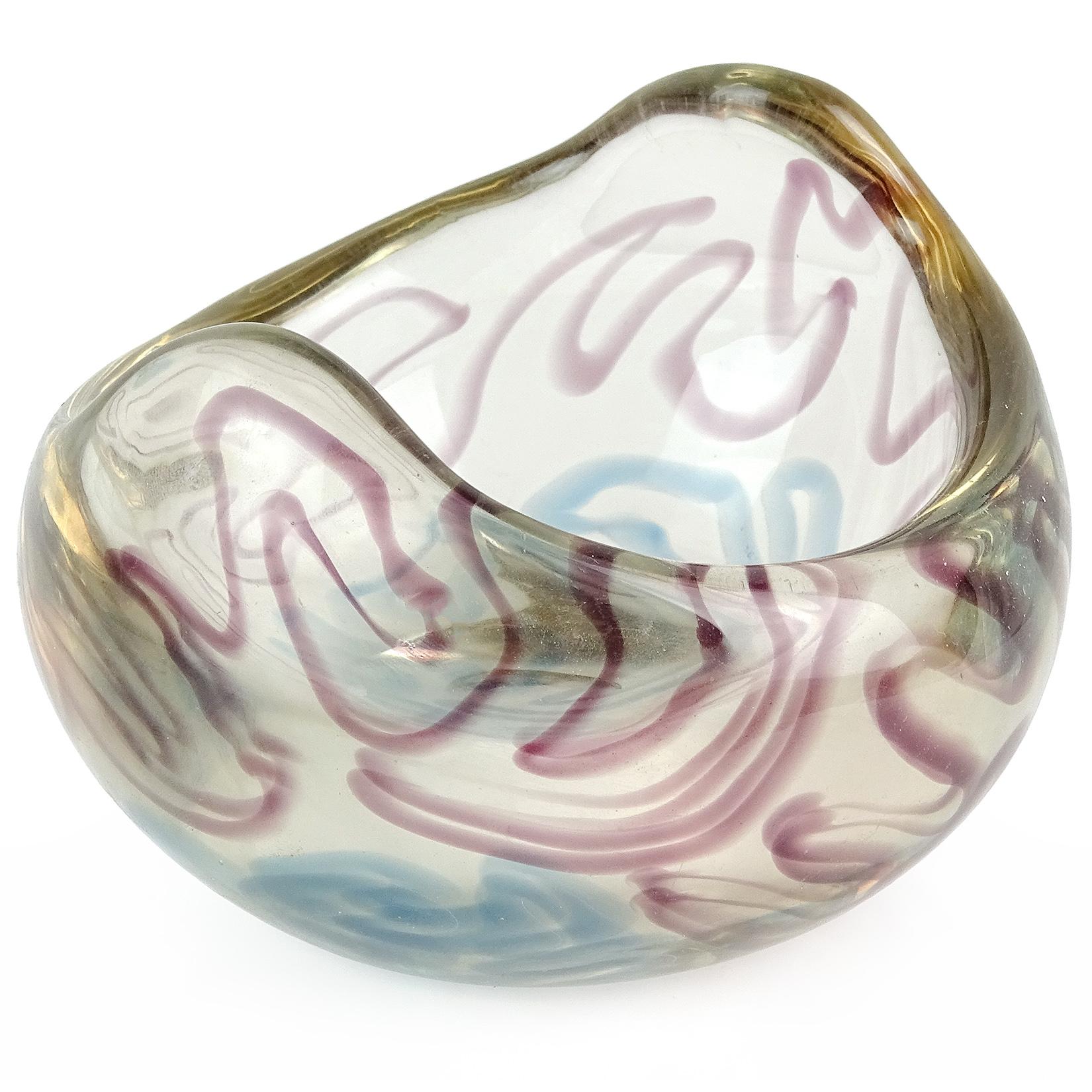 Beautiful Tora Pors hand blown blue and purple Swedish art glass bowl. Created in the Myrica technique, invented by Tora Pors, a Danish designer who worked for Kalmar Glasbruk (Swedish) from 1947-1954. The bowl has a swirling / squiggle design