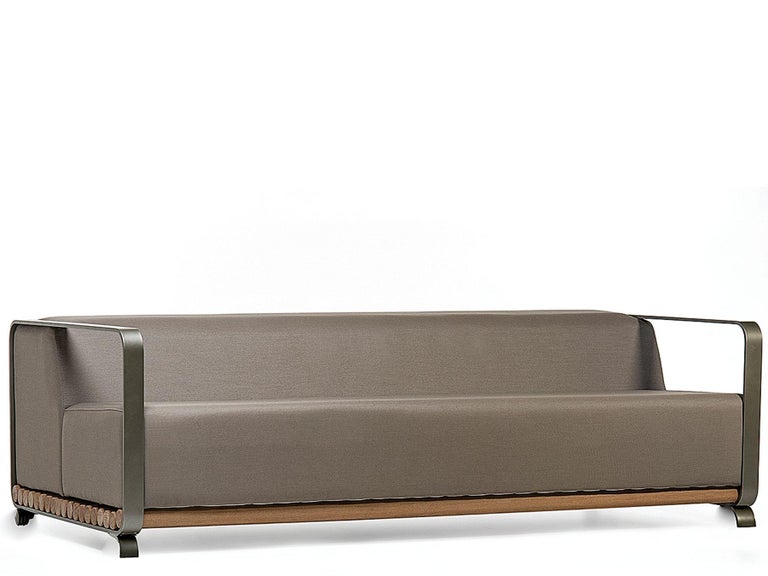 This sofa is made out of steel and solid Cumaru wood, a typical hardwood from the northern part of Brazil. 

Arthur Casas is surely one of the most prominent contemporary Brazilian architects. Running offices in São Paulo and New York, and with
