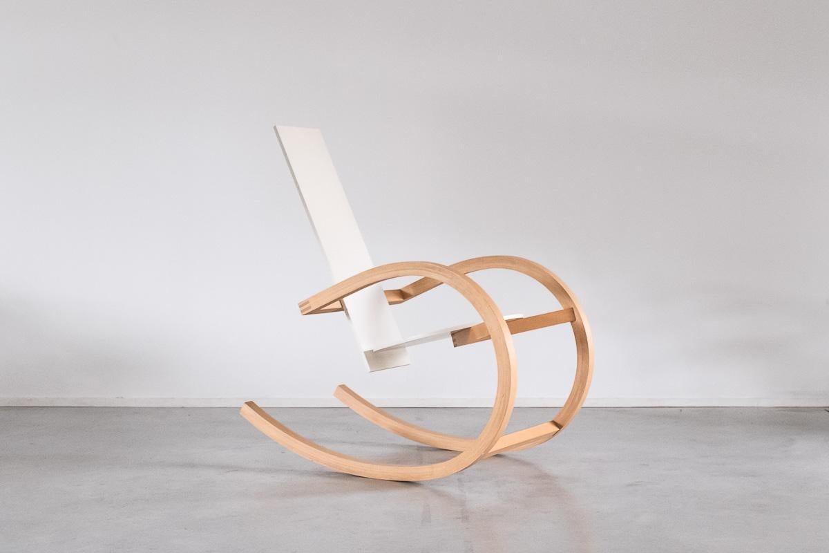 A sculptural armchair by the under rated Danish designer Torben Skov. The design of the chair was drawn over Classic Danish and American armchairs and minimized to a single geometric expression using the most hi-tech techniques of the time. The ply