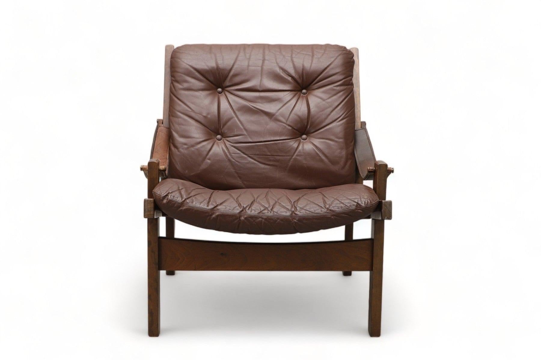 Origin: Norway
Designer: Torbjorn Afdal
Manufacturer: Bruksbo
Era: 1960s
Materials: Beech, Leather

Measurements: 26.5″ wide x 33.5″ deep x 31.5″ tall