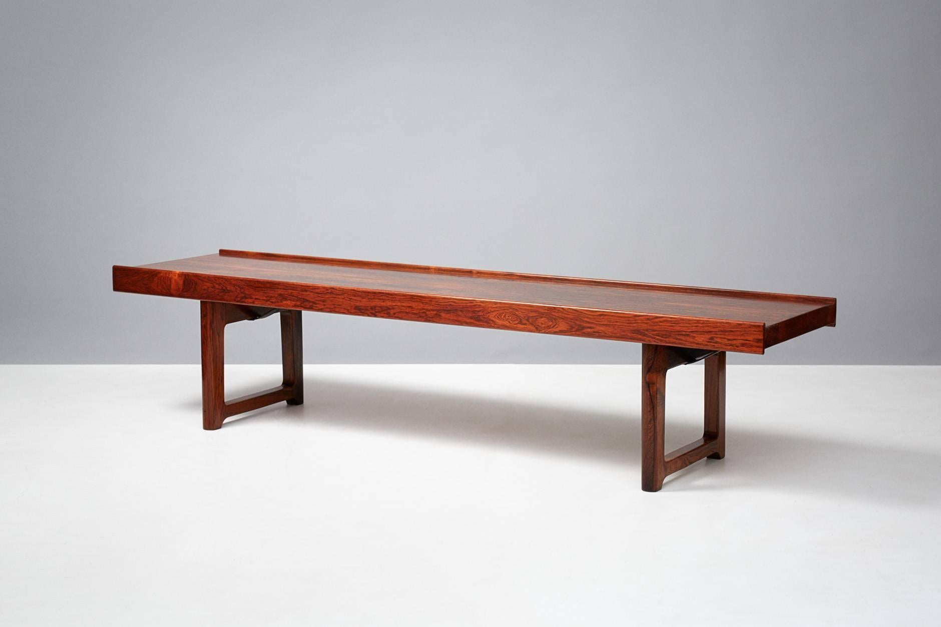 Torbjorn Afdal

Rosewood Krobo bench, circa 1960

Multipurpose bench from Norwegian designer Torbjorn Afdal for Bruksbo. Can be used as a bench or low coffee table.