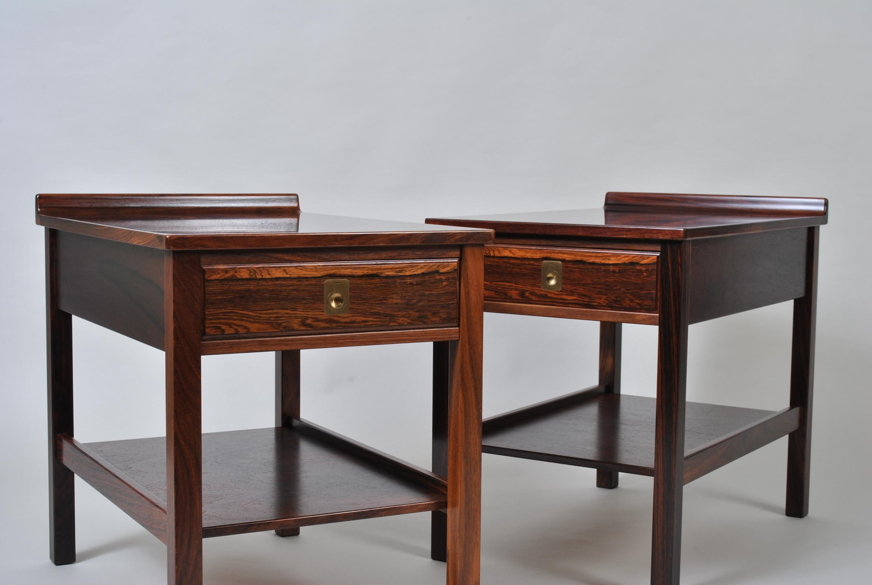 A very rare pair of rosewood nightstands or end tables by Torbjorn Afdal. Designed at Afdal’s Bruksbo design studios and produced by Mellemstrands, Norway, circa 1960. Extremely well crafted and highly practical. Classic Nordic midcentury design.