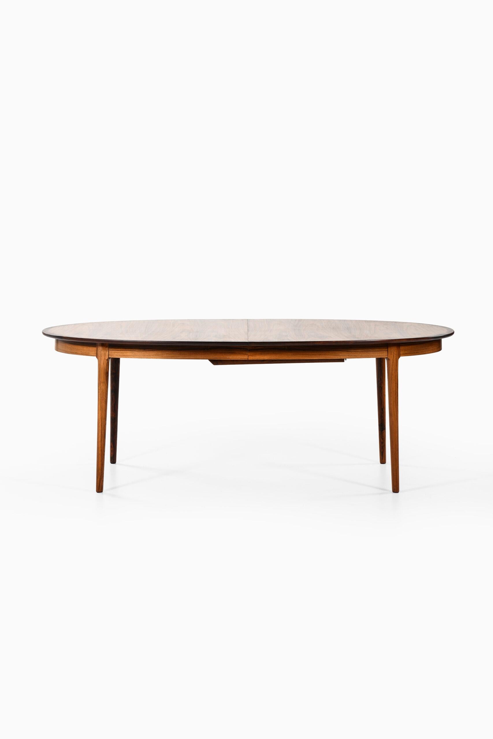 Rare dining table designed by Torbjørn Afdal. Produced by Bruksbo in Norway.
Width: 210 ( 310 ) cm.