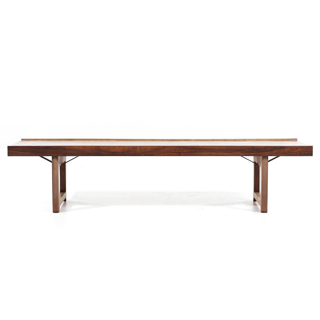 Torbjørn Afdal for Bruksbo Mid Century Rosewood Krobo Bench

This bench measures: 59.5 wide x 14.5 deep x 13.25 high

All pieces of furniture can be had in what we call restored vintage condition. That means the piece is restored upon purchase so